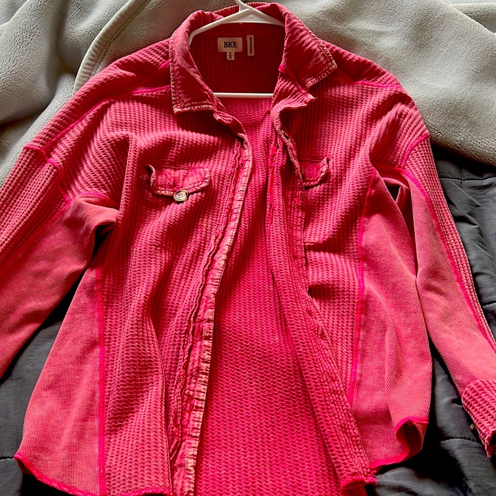 Button up long sleeve shirt.